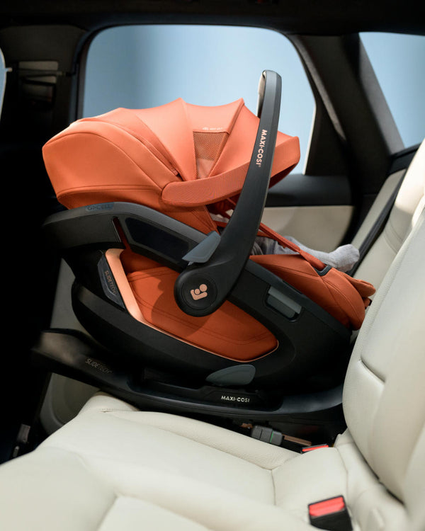 Maxi Cosi Coral Slide Pro i-Size Babyschale Onyx Black + Family Fix Slide Pro