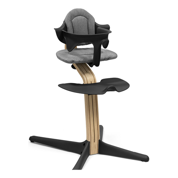 Stokke® Nomi® Stuhl Oak / Black + Babyset gratis